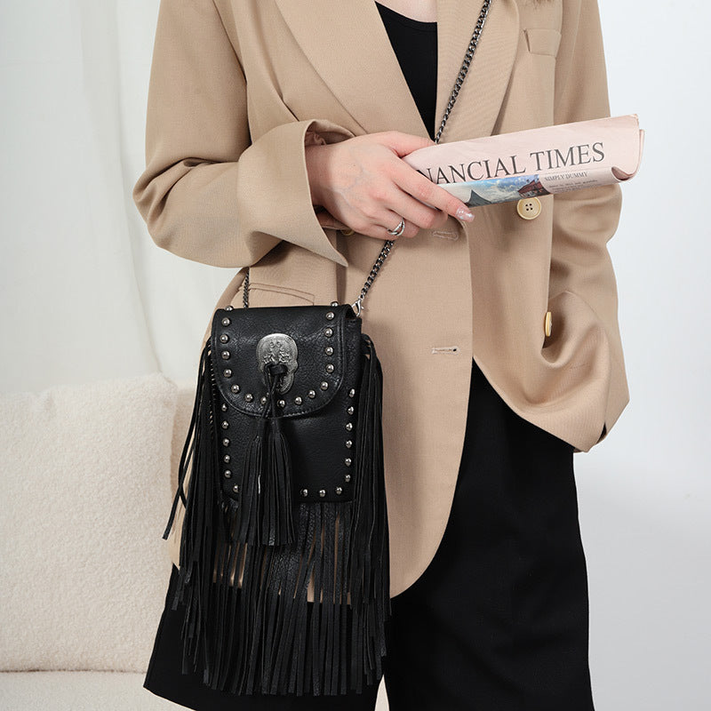 Sleek Soft Leather Studded Fringe Bag