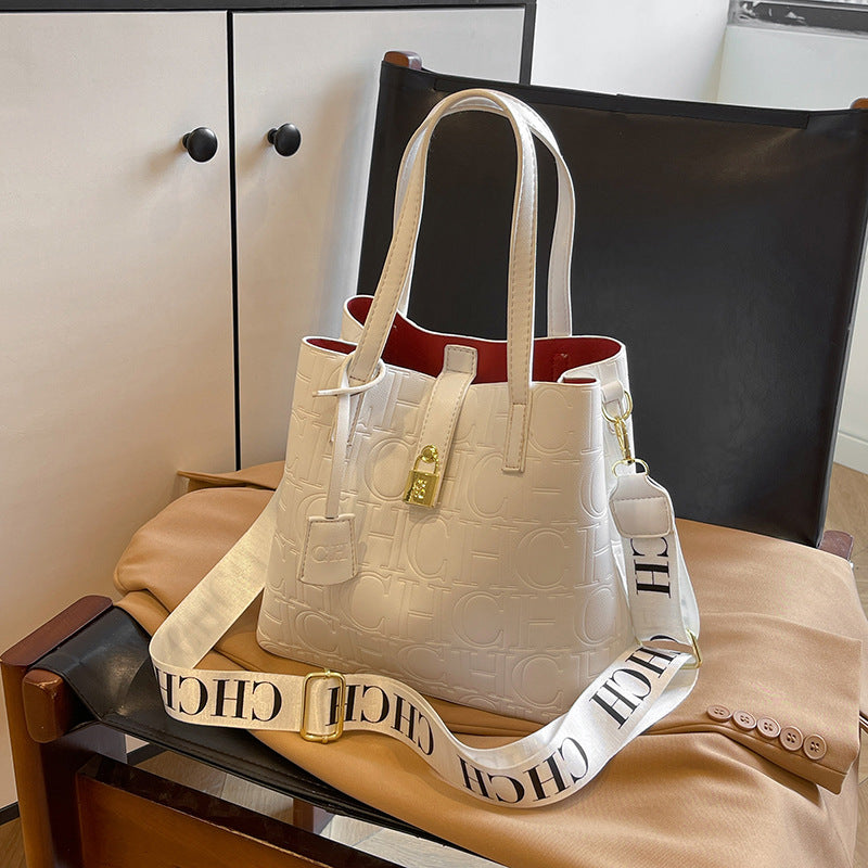 Letter Embossed Solid Color Fashion Retro Classic One-shoulder Portable Commuter Bucket Bag