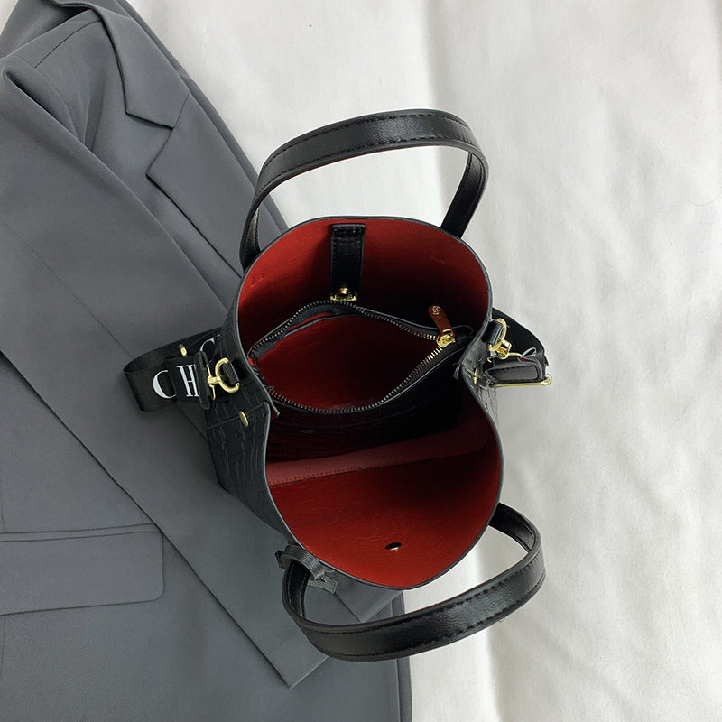 Letter Embossed Solid Color Fashion Retro Classic One-shoulder Portable Commuter Bucket Bag