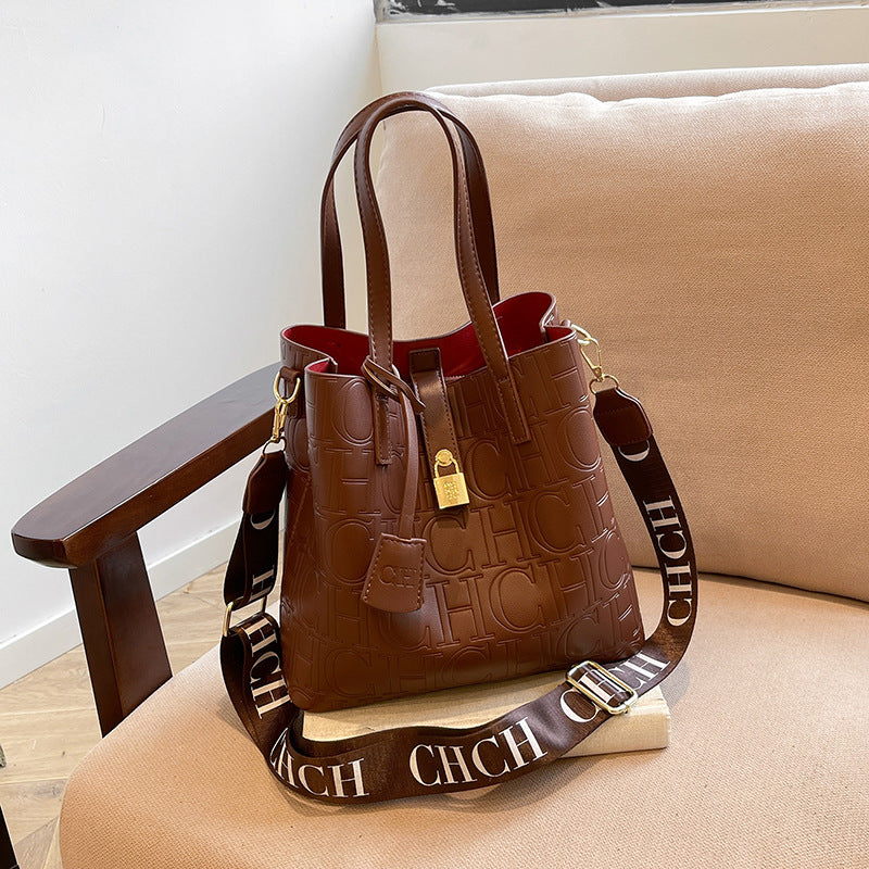 Letter Embossed Solid Color Fashion Retro Classic One-shoulder Portable Commuter Bucket Bag