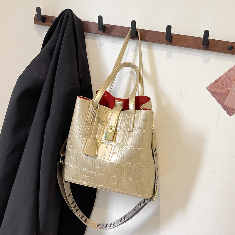 Letter Embossed Solid Color Fashion Retro Classic One-shoulder Portable Commuter Bucket Bag