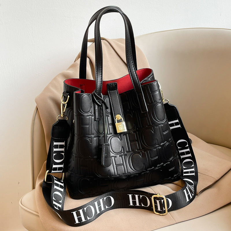 Letter Embossed Solid Color Fashion Retro Classic One-shoulder Portable Commuter Bucket Bag