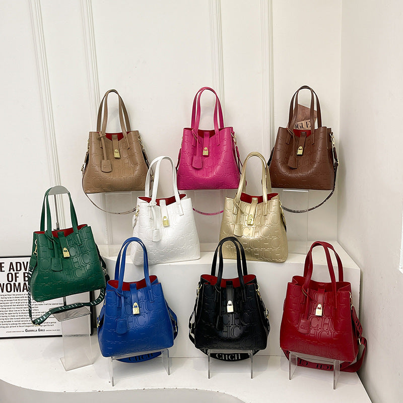 Letter Embossed Solid Color Fashion Retro Classic One-shoulder Portable Commuter Bucket Bag